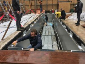 employees working on metal